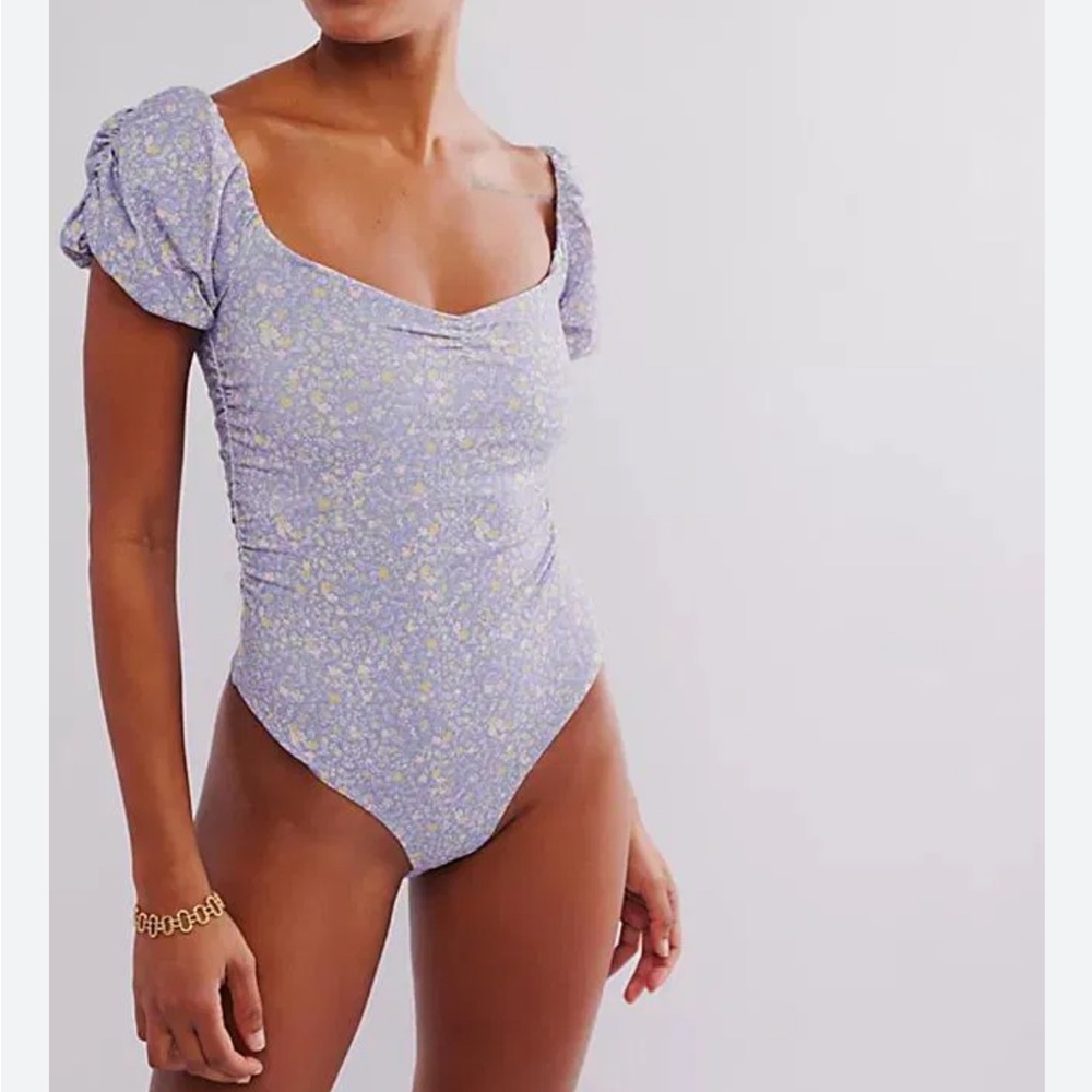 Free People Bella Lavender Floral Bodysuit Ruffle Sleeve. Snap closure. Size M